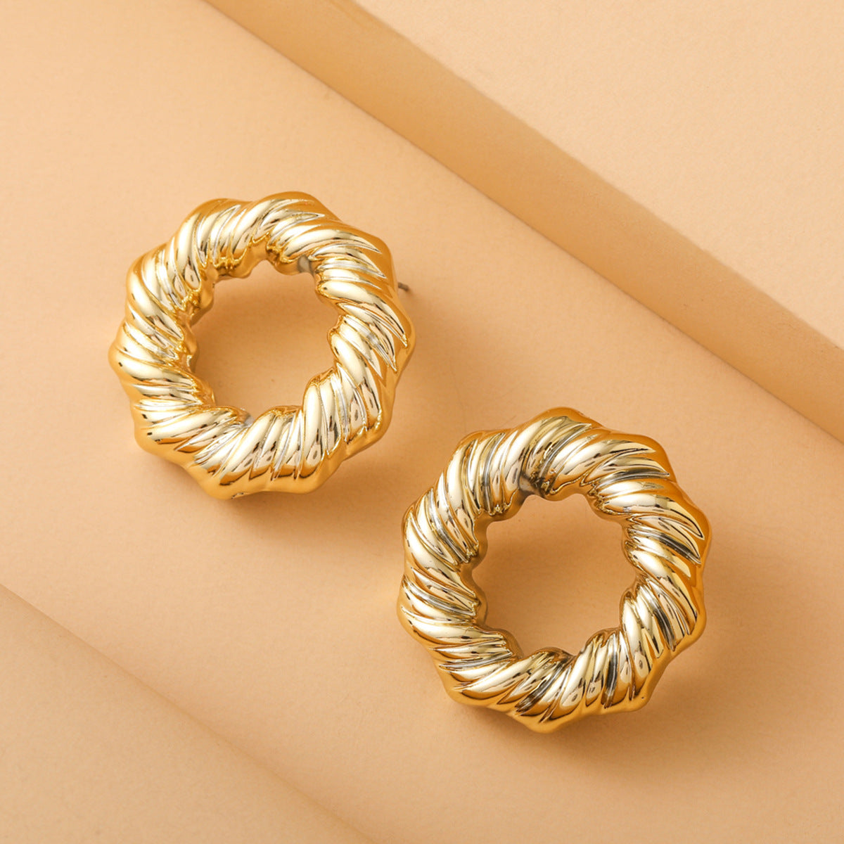 Women's Exaggerated Twisted Twist Circle Personality Gold-plated Hollow Stud Earrings